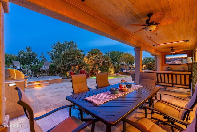 view of patio with ceiling fan