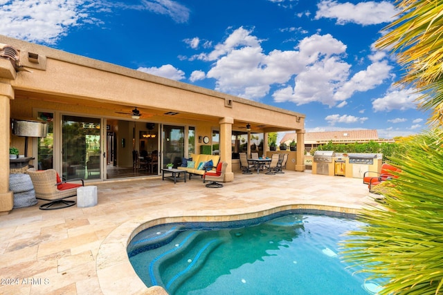 view of swimming pool featuring a patio, area for grilling, ceiling fan, and grilling area