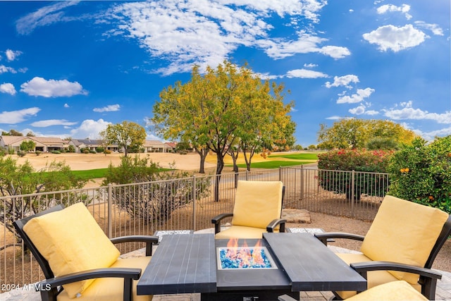 view of patio / terrace featuring a fire pit