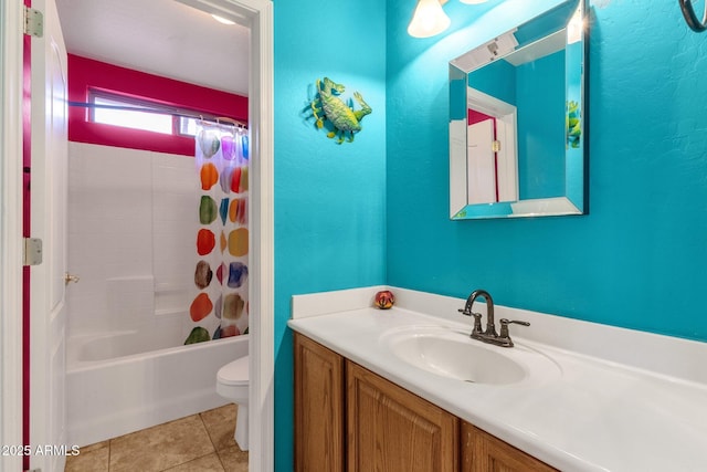 full bath featuring shower / bath combo with shower curtain, vanity, toilet, and tile patterned floors