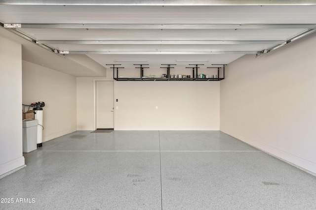 garage featuring baseboards