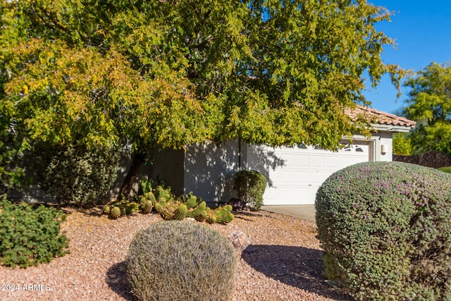 view of front of home with a garage