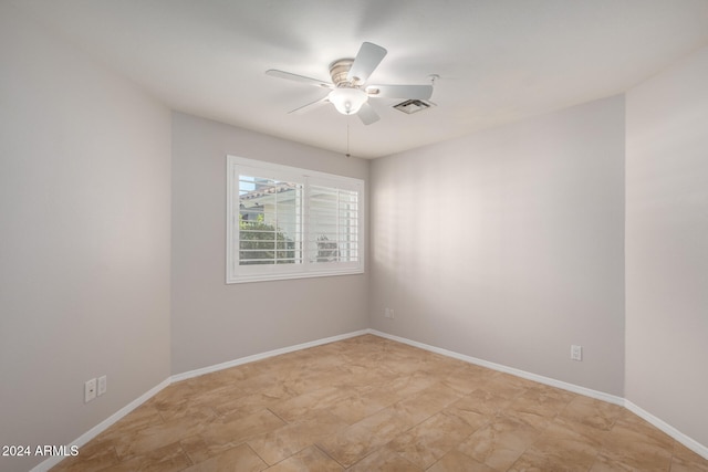 unfurnished room featuring ceiling fan