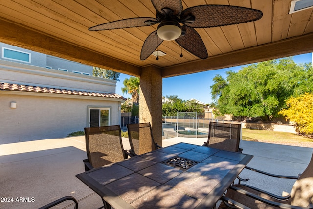 view of patio / terrace featuring ceiling fan