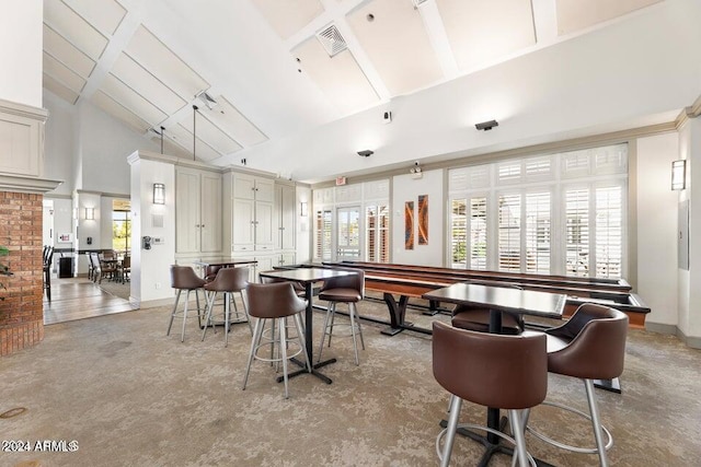 interior space featuring high vaulted ceiling