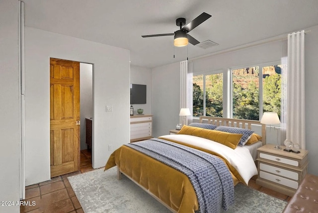 bedroom featuring ceiling fan