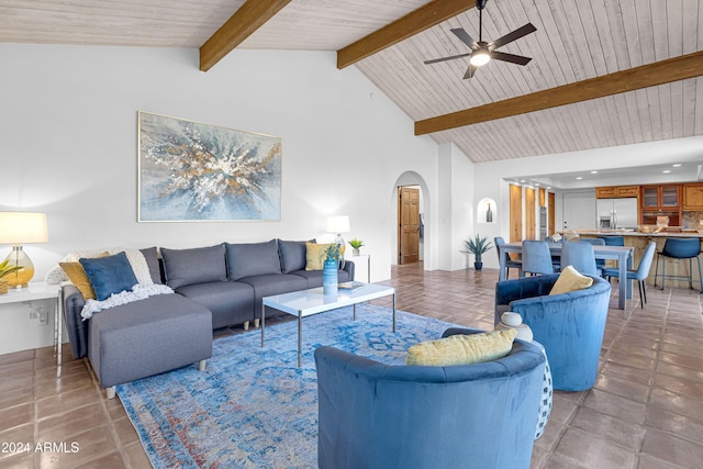 tiled living room with ceiling fan, beam ceiling, wooden ceiling, and high vaulted ceiling