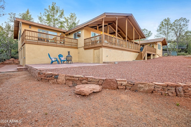 back of property featuring a patio area