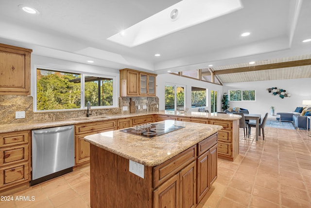 kitchen with black electric cooktop, lofted ceiling with beams, a kitchen island, and stainless steel dishwasher