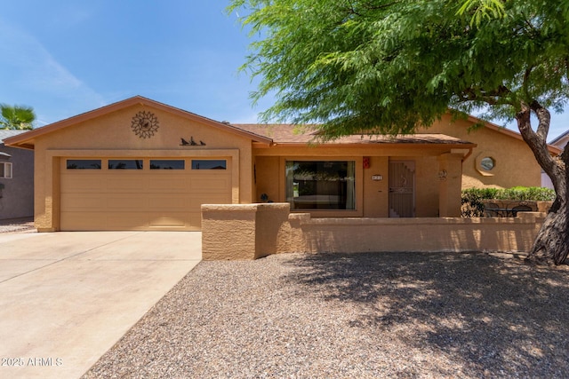 922 S 80th St, Mesa, AZ 85208 - view of front facade featuring an attached garage, stucco siding, and concrete driveway