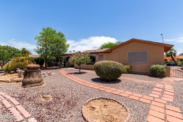 922 S 80th St, Mesa, AZ 85208 - back of property featuring stucco siding, a patio area, and a gate