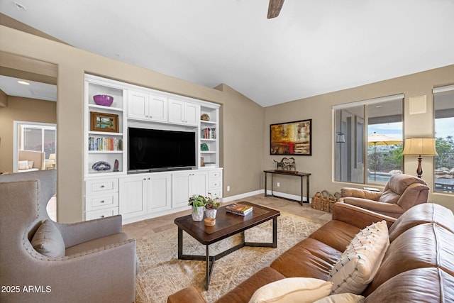 10623 E Acacia Dr, Scottsdale, AZ 85255 - living room featuring lofted ceiling, baseboards, and built in features