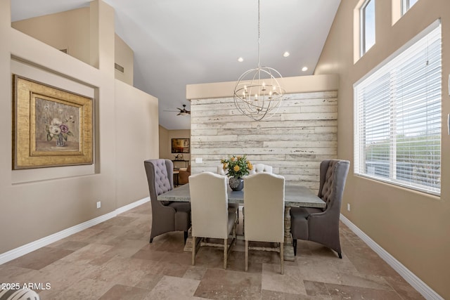 10623 E Acacia Dr, Scottsdale, AZ 85255 - dining area featuring baseboards, high vaulted ceiling, a healthy amount of sunlight, and stone finish floor