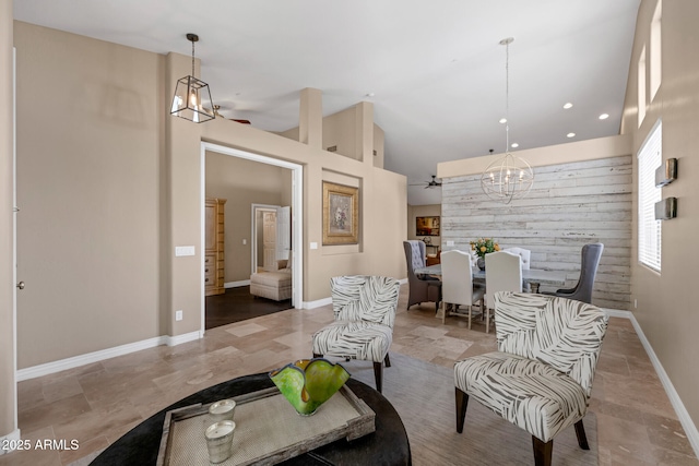 10623 E Acacia Dr, Scottsdale, AZ 85255 - living area with an inviting chandelier, high vaulted ceiling, baseboards, and recessed lighting