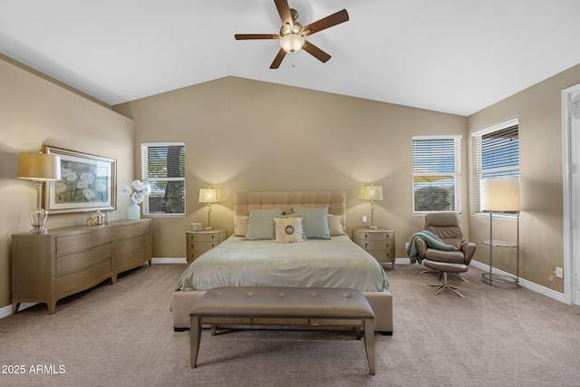 10623 E Acacia Dr, Scottsdale, AZ 85255 - carpeted bedroom with vaulted ceiling, baseboards, a ceiling fan, and multiple windows