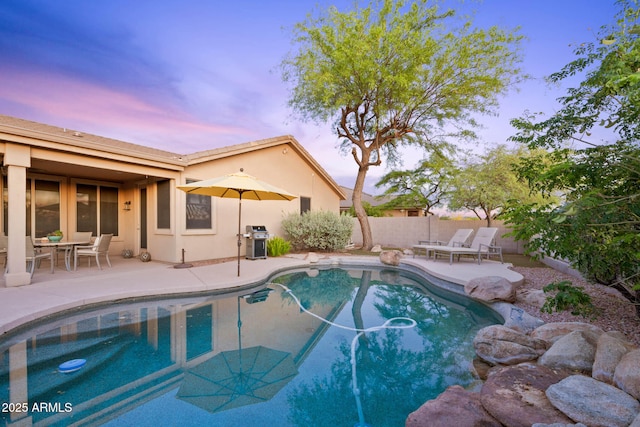 10623 E Acacia Dr, Scottsdale, AZ 85255 - view of swimming pool featuring a patio area, a fenced in pool, a fenced backyard, and grilling area
