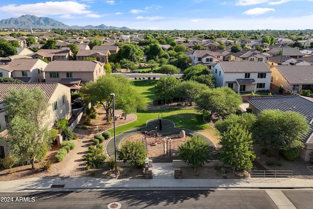 birds eye view of property featuring a mountain view