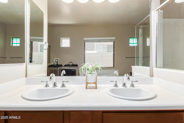 full bathroom with a sink, a shower with shower curtain, and double vanity