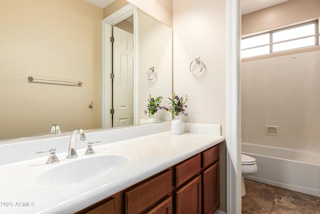 full bathroom featuring vanity and toilet