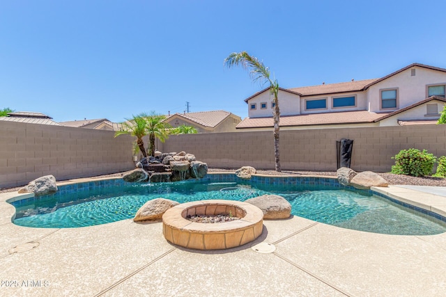 view of pool with a fenced in pool, a fenced backyard, and a patio