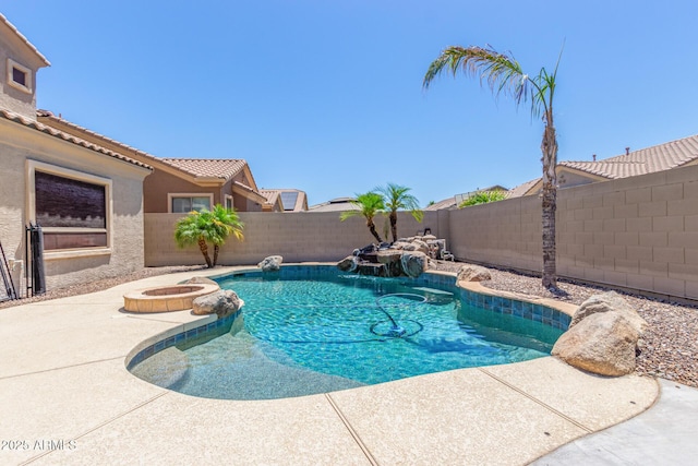 view of swimming pool with an outdoor hot tub, a patio area, a fenced backyard, and a fenced in pool