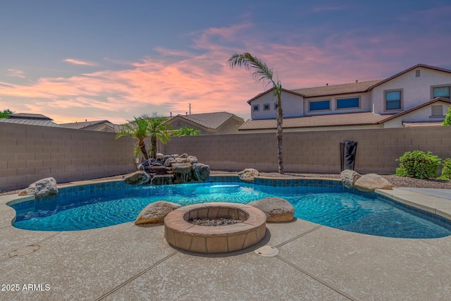 view of swimming pool with a fenced in pool, a fenced backyard, and a patio