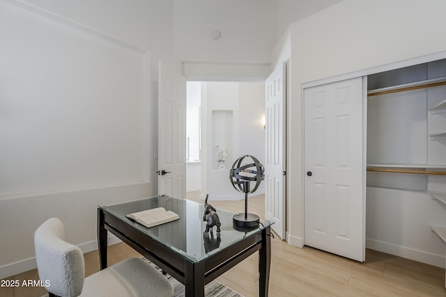 home office featuring light hardwood / wood-style flooring