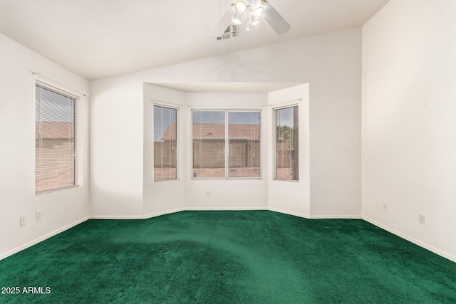 carpeted empty room featuring baseboards, ceiling fan, and a healthy amount of sunlight