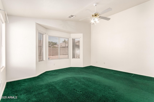 empty room featuring visible vents, carpet, ceiling fan, and baseboards