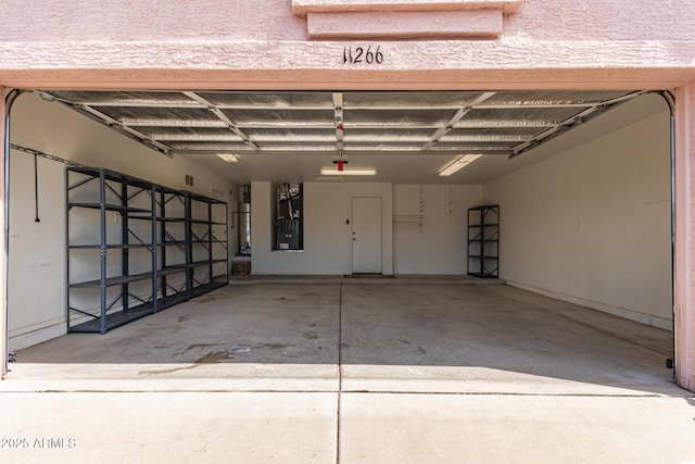 garage featuring heating unit