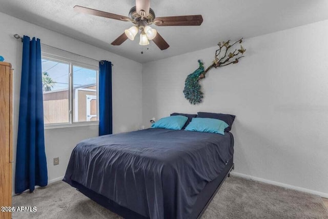 bedroom with light carpet and ceiling fan