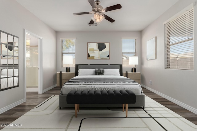 bedroom with dark wood-type flooring and ceiling fan