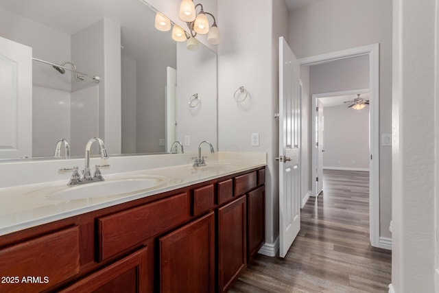 bathroom featuring vanity and hardwood / wood-style floors