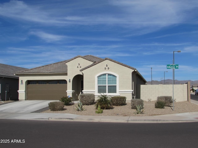 view of front of home with a garage