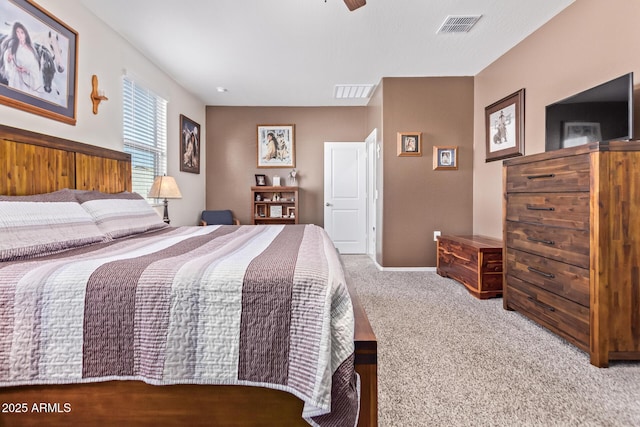 bedroom with ceiling fan and carpet floors