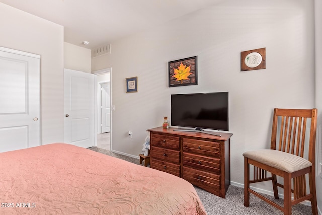 bedroom with light carpet