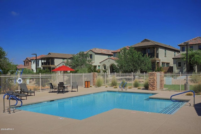 view of pool featuring a patio area