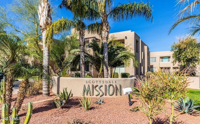 view of community sign