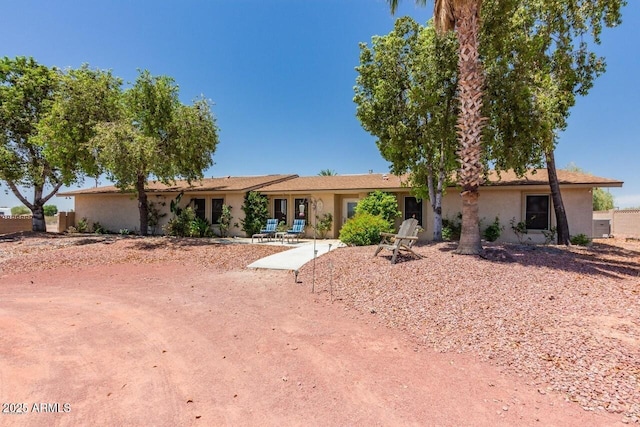 28648 N 165th Ave, Surprise, AZ 85387 - view of front facade featuring stucco siding and a patio