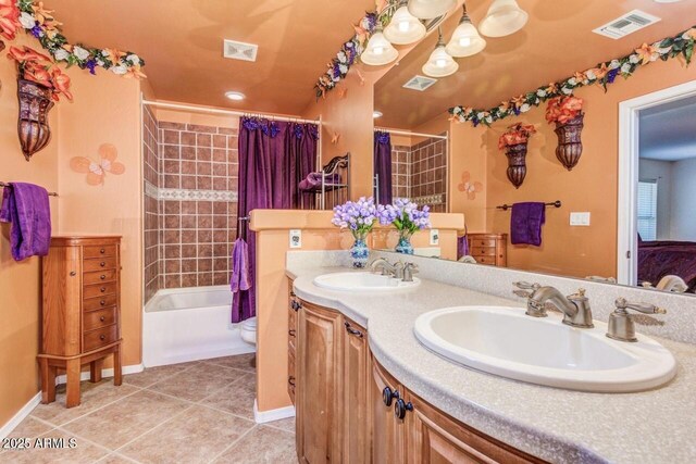 28648 N 165th Ave, Surprise, AZ 85387 - full bath featuring tile patterned floors, shower / bathtub combination with curtain, double vanity, toilet, and baseboards