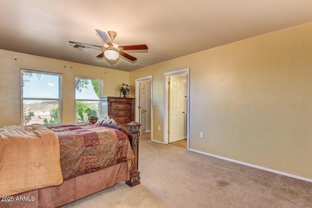 28648 N 165th Ave, Surprise, AZ 85387 - bedroom featuring light colored carpet, baseboards, and a ceiling fan