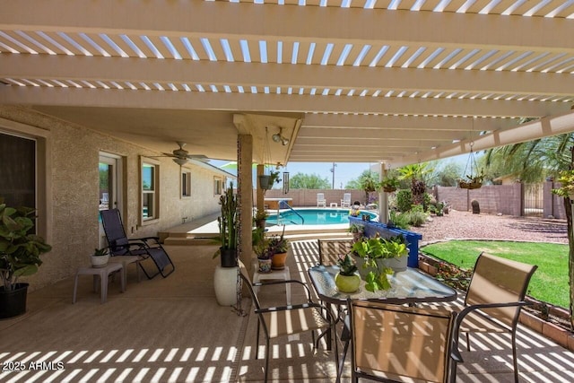 28648 N 165th Ave, Surprise, AZ 85387 - view of patio / terrace featuring ceiling fan, a fenced backyard, a pergola, and outdoor dining space