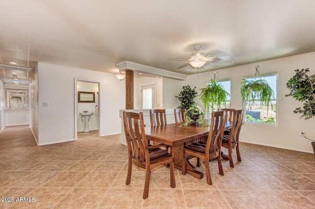 28648 N 165th Ave, Surprise, AZ 85387 - dining room with light tile patterned floors, a ceiling fan, and baseboards