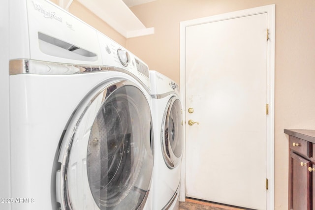 laundry room featuring independent washer and dryer