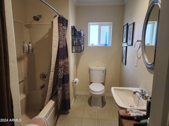 full bathroom with toilet, sink, shower / tub combo with curtain, and ornamental molding