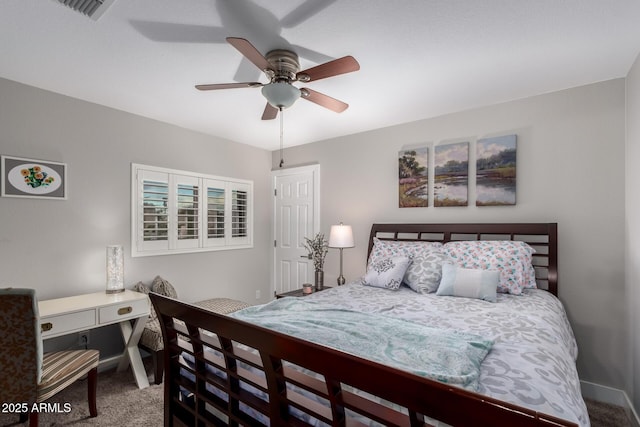 bedroom featuring visible vents, baseboards, carpet, and a ceiling fan