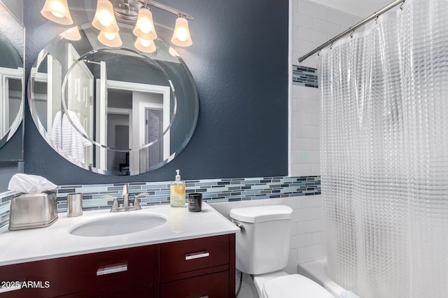 bathroom with vanity, shower / bath combo, a notable chandelier, toilet, and a textured wall