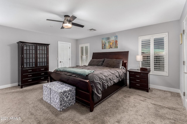 bedroom featuring visible vents, carpet flooring, a ceiling fan, and baseboards