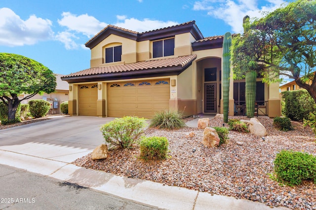2758 N Sterling, Mesa, AZ 85207 - mediterranean / spanish house with stucco siding, concrete driveway, and a tile roof