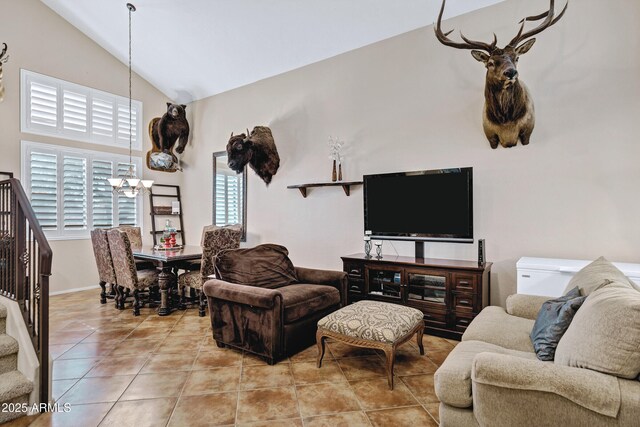 2758 N Sterling, Mesa, AZ 85207 - living room with tile patterned flooring, a chandelier, baseboards, and high vaulted ceiling